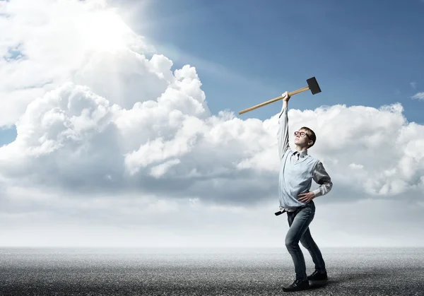 Teenager boy holding hammer — Stock Photo, Image