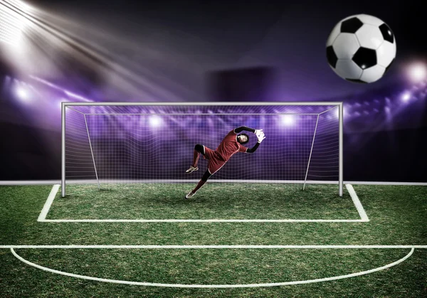 Goalkeeper in gates jumping — Stock Photo, Image