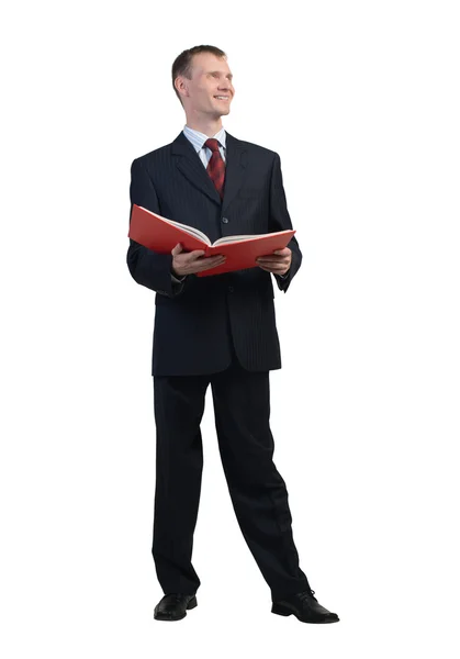 Businessman reading red book — Stock Photo, Image