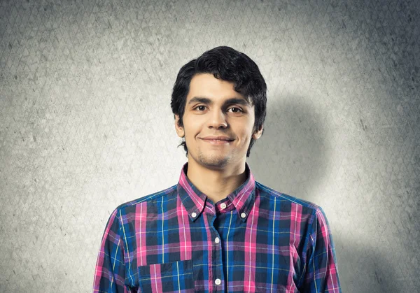 Genç adam ekose desenli gömlek — Stok fotoğraf