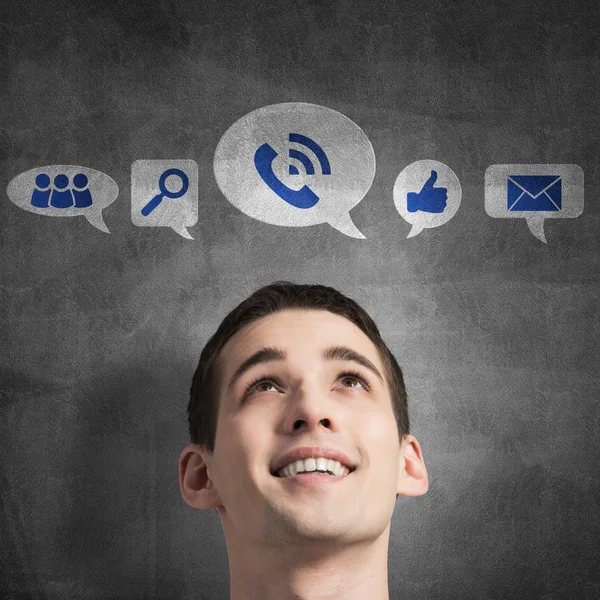 Man in red bowtie and collection of icons — Stock Photo, Image