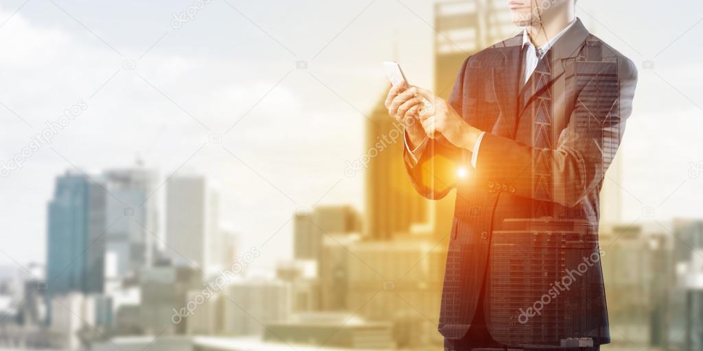 Businessman using mobile phone