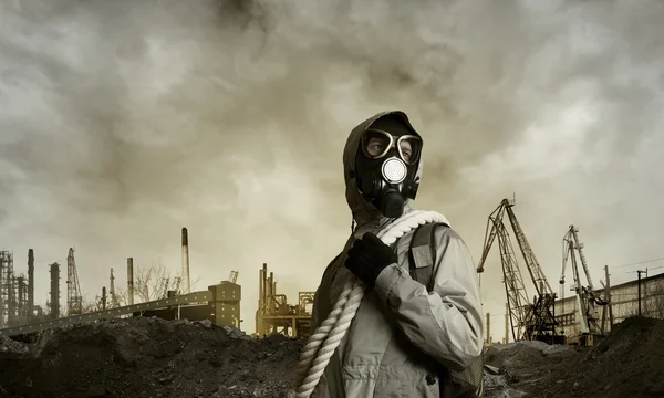 Man survivor in gas mask — Stock Photo, Image