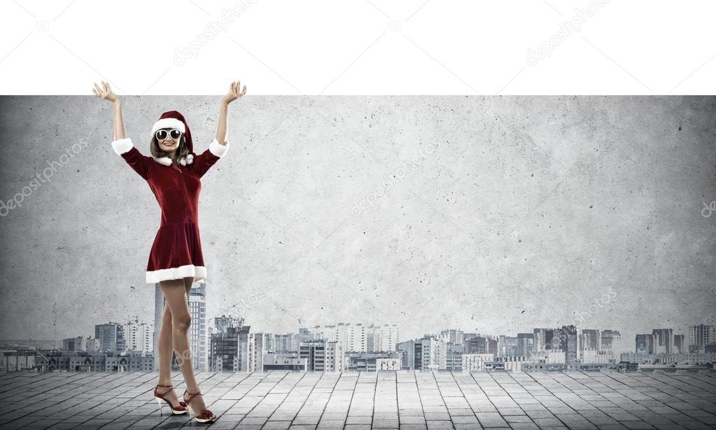 Santa woman with blank banner.