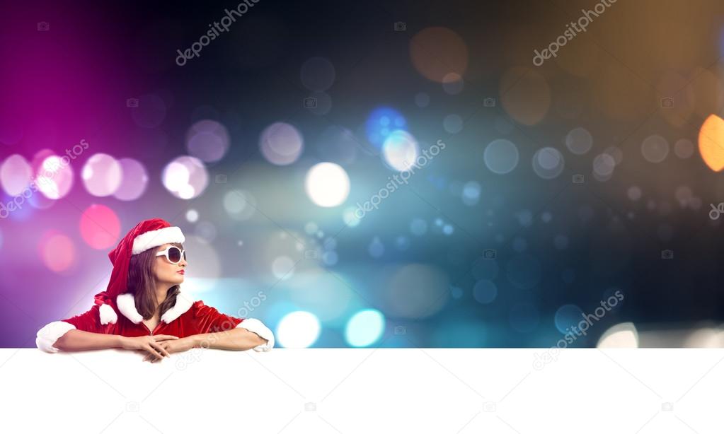 Santa woman with blank banner.