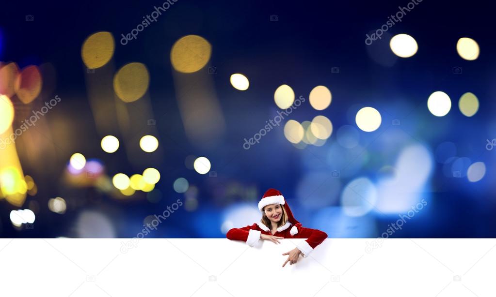 Santa woman with blank banner.