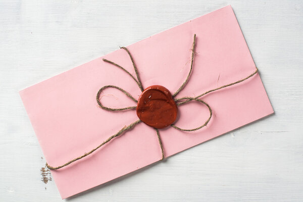 Letter with seal on table