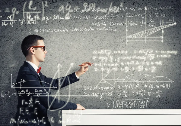 Student drawing science formulas — Stock Photo, Image