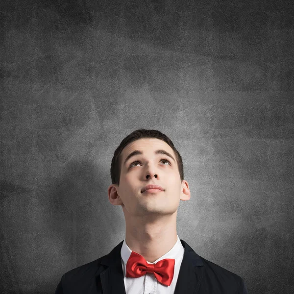 Young man wearing red bow tie — стоковое фото