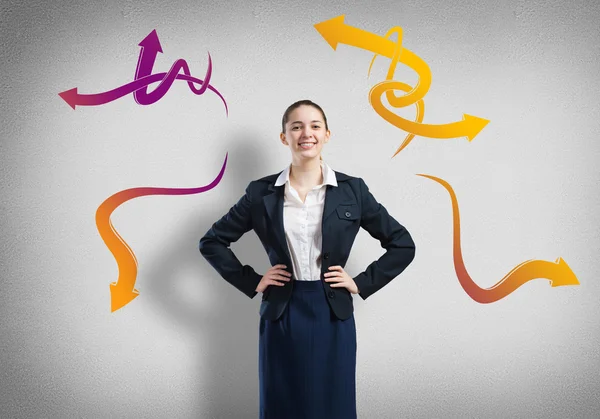 Businesswoman and drawn arrows — Stock Photo, Image