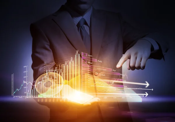 Businessman holding virtual graph — Stock Photo, Image