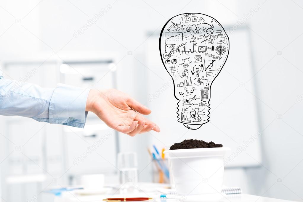 business person pointing at plan