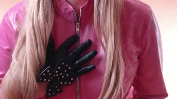 Woman dressed in PVC fashion coat — Stock Video