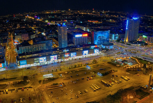 Aerial panoramic view at Warsaw downtown by night, from the top of Palace of Culture and Science, Warsaw, Poland