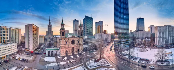 stock image Beautiful panoramic aerial drone view on All Saints Church - Roman Catholic church located at Grzybowski Square, Warsaw City Skyscrapers, PKiN, and Varso Tower under construction. Warsaw, Poland.