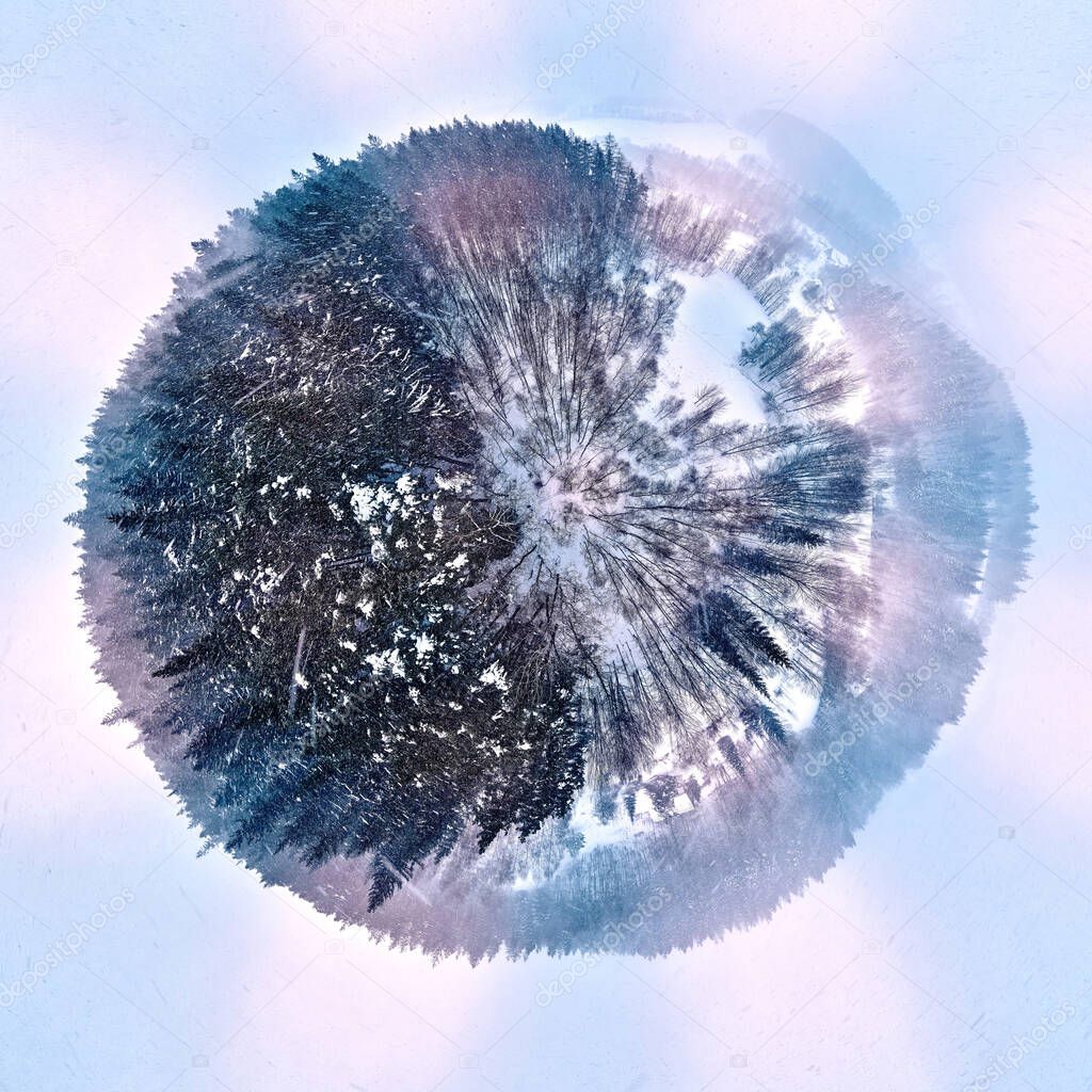 Beautiful little planet panorama panoramic aerial drone view on a winter landscape in the Stolowe mountains during a snowfall. The Stolowe Mountains National Park, Poland, Europe.