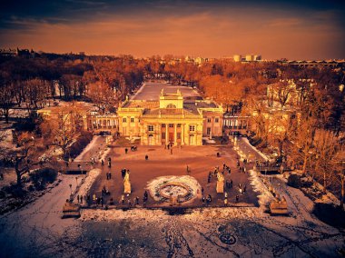 Beautiful panoramic aerial drone view of the Palace on the Isle (Polish: Palac Na Wyspie), also known as Baths Palace (Polish: Palac Lazienkowski), is a classicist palace in Warsaw's Royal Baths Park. clipart