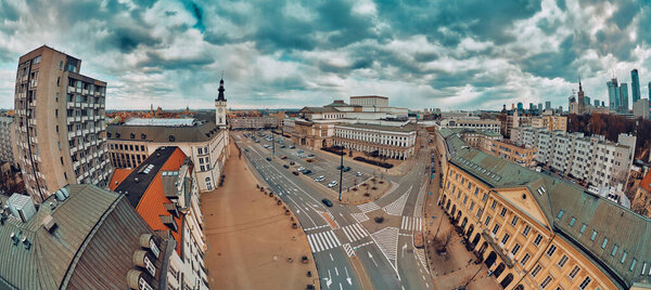 Beautiful panoramic aerial drone skyline view of the Warsaw Grand Theatre (national opera house) on the Theater square (POL: Plac Teatralny), Poland, EU