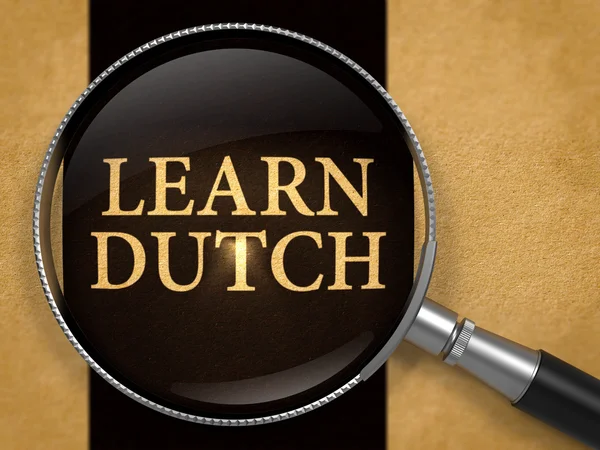 Μάθετε Ολλανδικά μέσω του φακού σε παλιό χαρτί. — Φωτογραφία Αρχείου