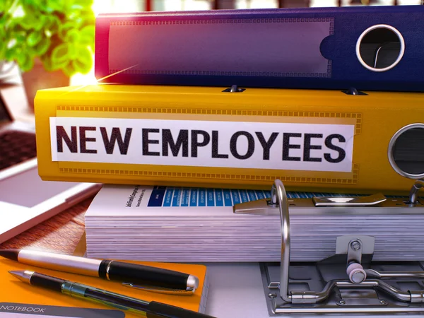 Yellow Office Folder with Inscription New Employees. — Stock Photo, Image