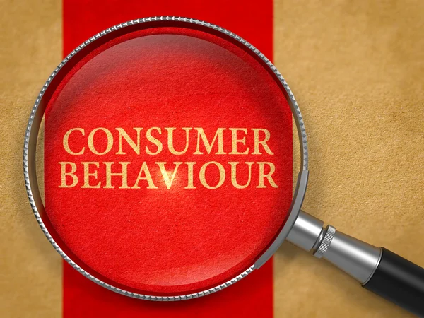 Consumer Behaviour through Loupe on Old Paper. — Stock Fotó