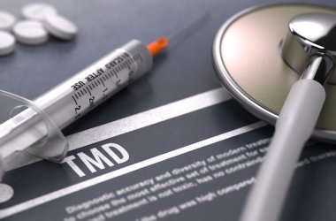 TMD - Printed Diagnosis on Grey Background.