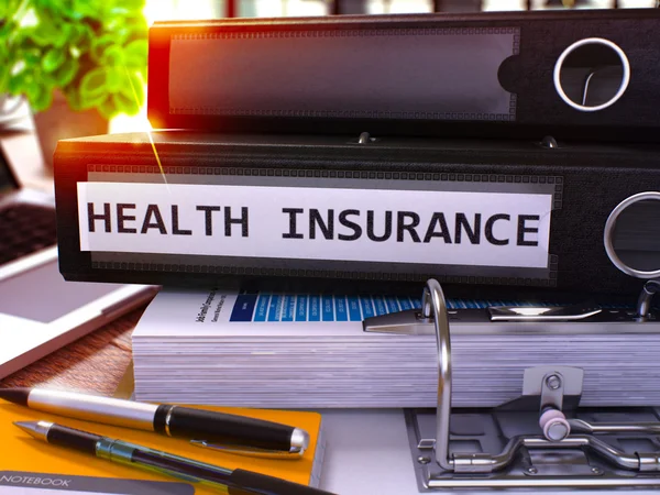 Black Ring Binder with Inscription Health Insurance. — Stock Photo, Image