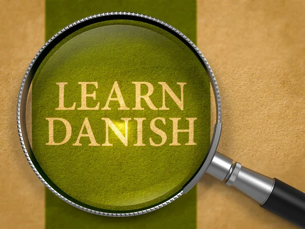 Learn Danish through Loupe on Old Paper. — 스톡 사진