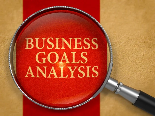 Business Goals Analysis Concept through Magnifier. — Stock Photo, Image