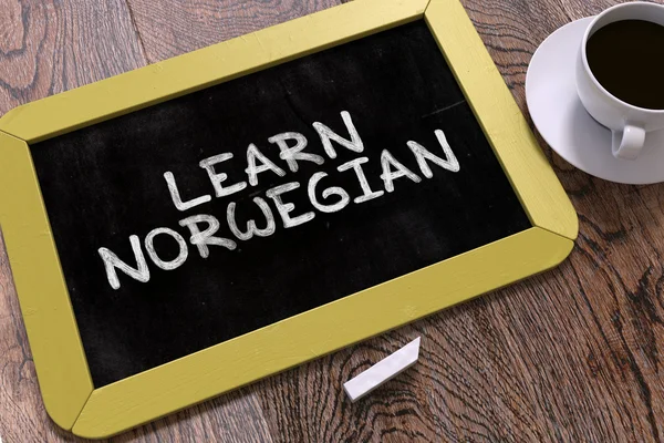 Učit se Norština ruka nakreslena na tabuli. — Stock fotografie