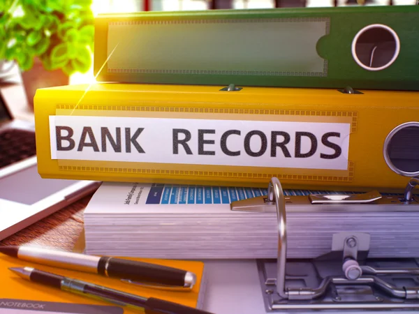 Yellow Ring Binder with Inscription Bank Records. — Stock Photo, Image