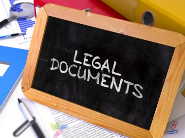 Hand Drawn Legal Documents Concept on Small Chalkboard.