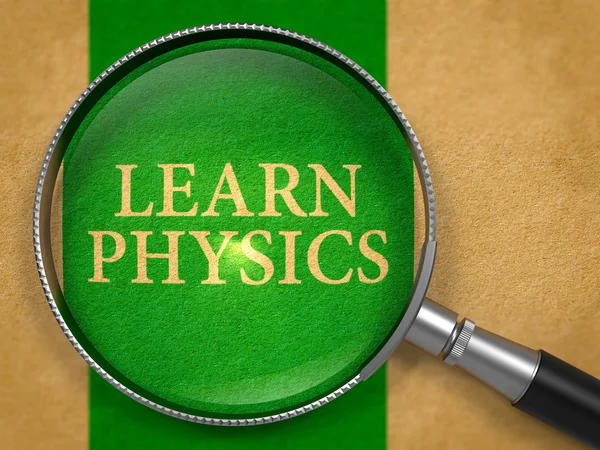 Physik lernen durch Lupe auf altem Papier. — Stockfoto