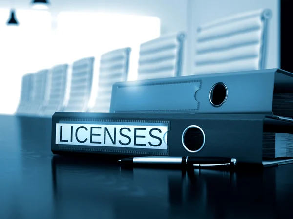 Licenses on Office Binder. Toned Image. — Stock Photo, Image