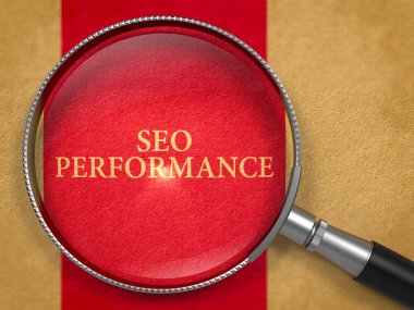 SEO Performance through Loupe on Old Paper.