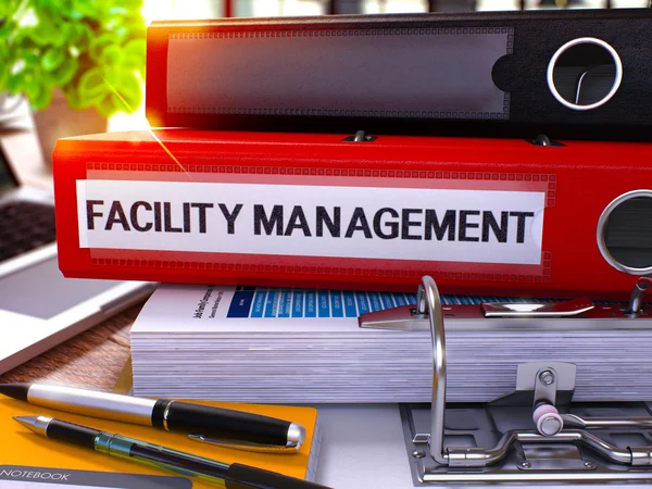 Red Office Folder with Inscription Facility Management. — Stock Photo, Image