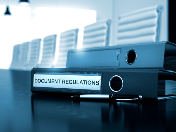 Document Regulations on Office Binder. Blurred Image.