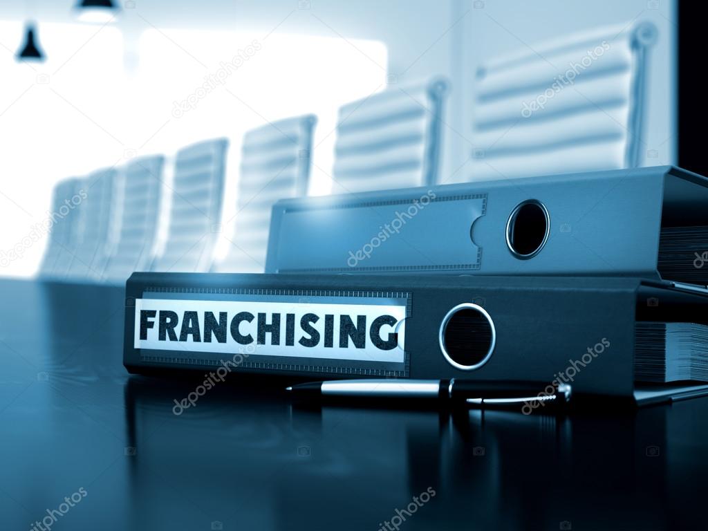 Franchising on Ring Binder. Blurred Image.