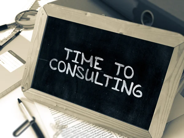 Handwritten Time to Consulting on a Chalkboard. — Stock Photo, Image