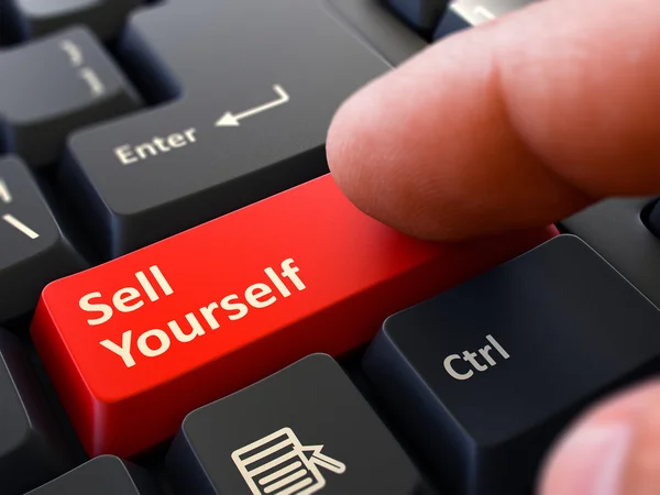 赤いボタンを押すと、黒いキーボードで自分自身を販売. — ストック写真
