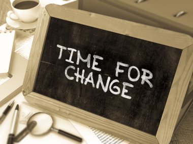 Time for Change Concept Hand Drawn on Chalkboard.
