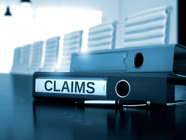 Claims on Ring Binder. Toned Image.