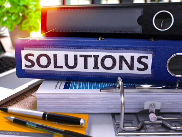 Solutions on Blue Ring Binder. Blurred, Toned Image. — Stock Photo, Image