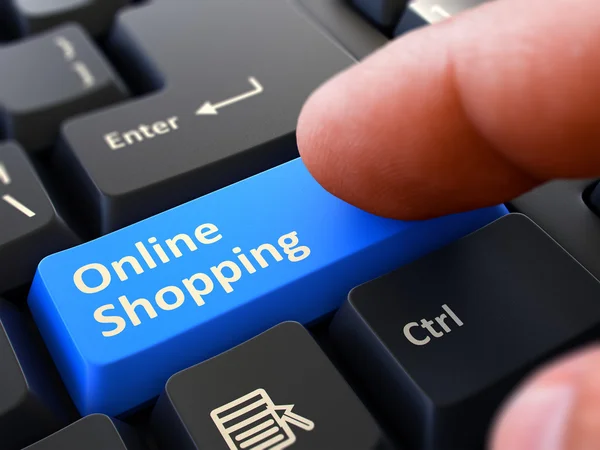 Online winkelen-klikken op blauwe toetsenbord knop. — Stockfoto