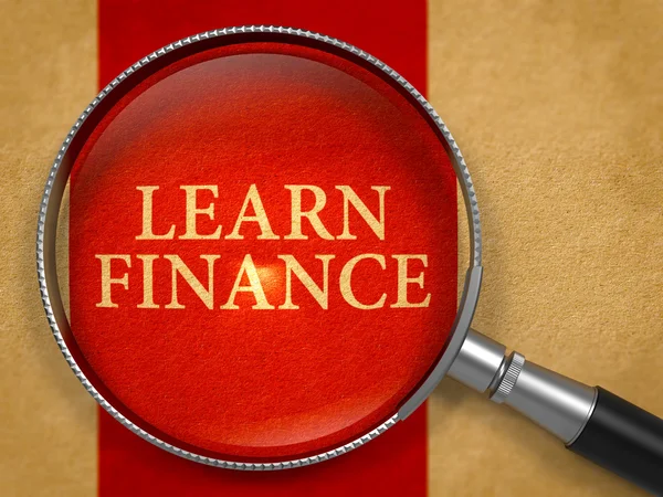 Aprende finanzas a través de lupa . — Foto de Stock