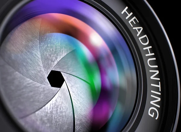 Kamera Lens i önünde Headhunting. Closeup. — Stok fotoğraf