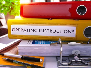 Yellow Ring Binder with Inscription Operating Instructions.