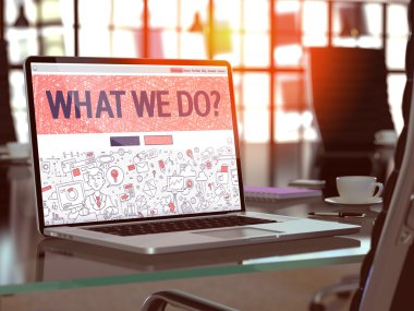 What We Do on Laptop in Modern Workplace Background.