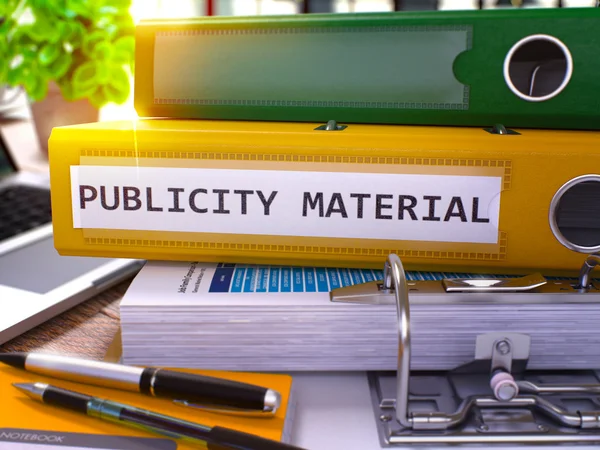 Publiciteitsmateriaal op gele ring Binder. Wazig, afgezwakt beeld. — Stockfoto