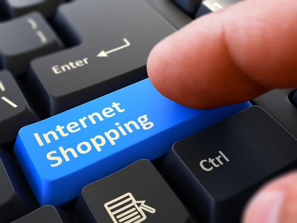 Pressing Blue Button Internet Shopping on Black Keyboard. — стокове фото